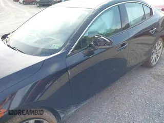2021 Mazda 3 Premium z VIN 3MZBPADL2MM254467, wystawiony jako IAAI lot #42151557 z przebiegiem 63 282 mil mil oraz . Historia ofert i sprzedaży dostępna na DreamBid. Obrazek 6.