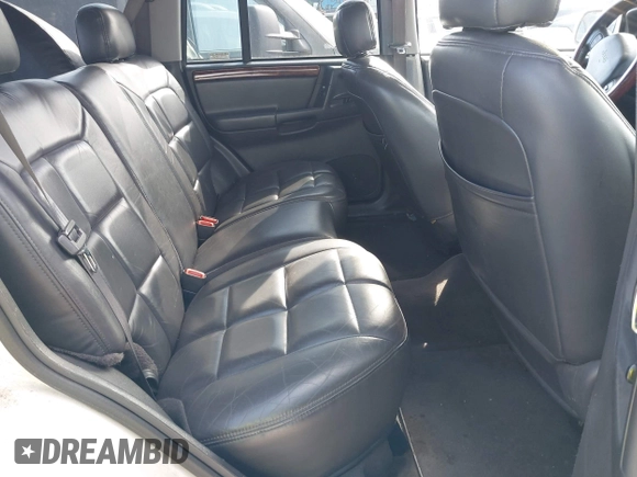 1998 Jeep Grand Cherokee Limited z VIN 1J4GZ78Y9WC342250, wystawiony jako IAAI lot #42047991 z przebiegiem 271 579 mil mil oraz . Historia ofert i sprzedaży dostępna na DreamBid. Obrazek 8.
