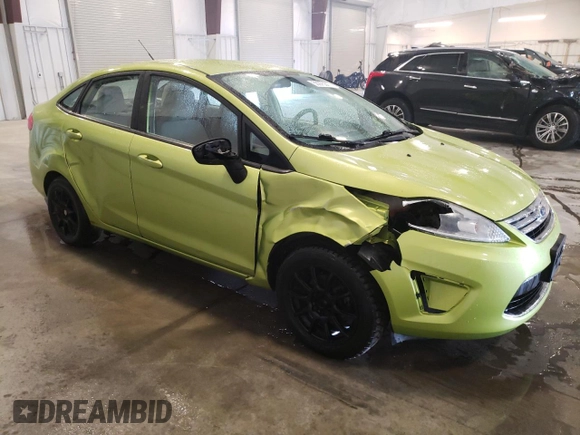 2011 Ford Fiesta SE with VIN 3FADP4BJ2BM153639, listed as a Copart auction lot 50975305 with 128,711 mi miles and Salvage Title. Bid and sale history available at carsss.com. Image 4.