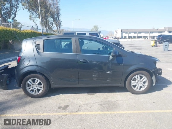 2014 Chevrolet Sonic LT with VIN 1G1JC6SG4E4118781, listed as a IAAI auction lot 41862192 with 124,375 mi miles. Bid and sale history available at carsss.com. Image 14.