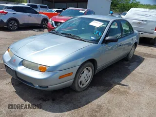 2002 Saturn SL z VIN 1G8ZK52732Z152274, wystawiony jako IAAI lot #42103737 z przebiegiem 56 781 mil mil oraz . Historia ofert i sprzedaży dostępna na DreamBid. Obrazek 2.