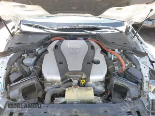 2014 Infiniti Q50 Hybrid Premium z VIN JN1AV7AP3EM690226, wystawiony jako IAAI lot #42259111 z przebiegiem 140 424 mil mil oraz . Historia ofert i sprzedaży dostępna na DreamBid. Obrazek 10.