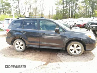 2014 Subaru Forester 2.5i Premium with VIN JF2SJAEC1EH477920, listed as a IAAI auction lot 41974390 with 145,837 mi miles. Bid and sale history available at carsss.com. Image 13.