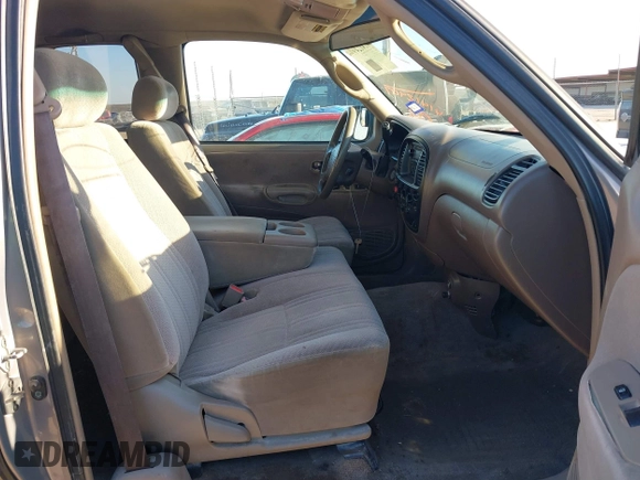 2000 Toyota Tundra SR5 with VIN 5TBRT3413YS019873, listed as a IAAI auction lot 41412497 with 305,472 mi miles and . Bid and sale history available at DreamBid. Image 5.