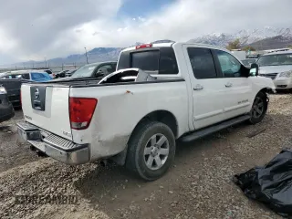 2005 Nissan Titan SE with VIN 1N6AA07B65N566549, listed as a Copart auction lot 80915034 with 268,827 mi miles and Salvage Title. Bid and sale history available at carsss.com. Image 3.