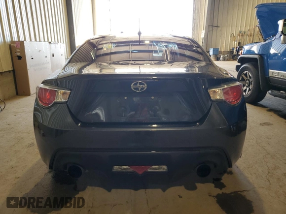 2014 Scion FR-S z VIN JF1ZNAA11E9701435, wystawiony jako Copart lot #72603834 z przebiegiem 127 940 mil mil oraz Szkoda całkowita • Salvage title. Historia ofert i sprzedaży dostępna na DreamBid. Obrazek 6.