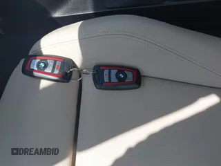 2016 BMW 2 Series 228i xDrive with VIN WBA1L9C50GV324910, listed as a IAAI auction lot 42153692 with 48,785 mi miles and . Bid and sale history available at DreamBid. Image 11.