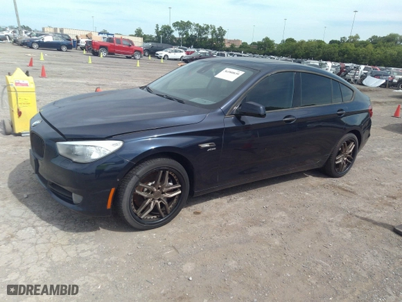 2012 BMW 5 Series Gran Turismo 550i xDrive with VIN WBASP4C53CC341928, listed as a IAAI auction lot 36580839 with 93,808 mi miles. Bid and sale history available at carsss.com. Image 2.