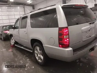 2011 Chevrolet Suburban LTZ with VIN 1GNSKKE31BR143238, listed as a IAAI auction lot 41621927 with 224,313 mi miles and . Bid and sale history available at DreamBid. Image 3.