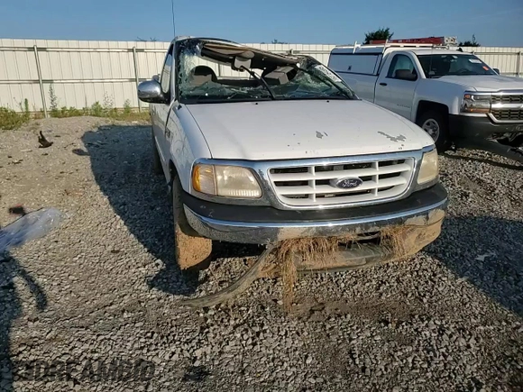 2000 Ford F-150 XL with VIN 1FTZF1727YKB49797, listed as a Copart auction lot 62154595 with Not provided miles and Salvage title. Bid and sale history available at DreamBid. Image 12.