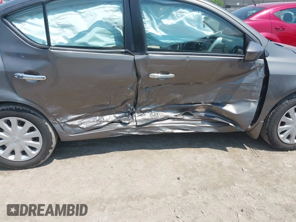 2016 Nissan Versa S with VIN 3N1CN7AP5GL893320, listed as a IAAI auction lot 42685446 with 76,754 mi miles and . Bid and sale history available at DreamBid. Image 6.