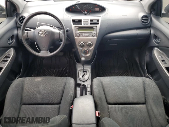 2012 Toyota Yaris z VIN JTDBT4K35CL017457, wystawiony jako Copart lot #58820985 z przebiegiem 120 901 mil mil oraz Szkoda całkowita • Salvage title. Historia ofert i sprzedaży dostępna na DreamBid. Obrazek 8.