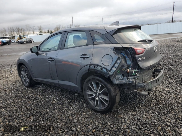 2017 Mazda CX-3 Touring with VIN JM1DKFC74H0176455, listed as a Copart auction lot 48825935 with 90,486 mi miles and Salvage Title. Bid and sale history available at carsss.com. Image 2.