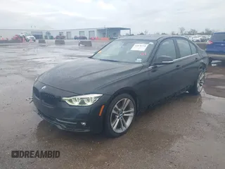 2017 BMW 3 Series 330i with VIN WBA8B9C58HK675679, listed as a IAAI auction lot 41878310 with 87,310 mi miles and . Bid and sale history available at DreamBid. Image 2.