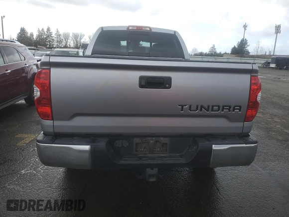 2017 Toyota Tundra SR z VIN 5TFUY5F18HX597005, wystawiony jako Copart lot #43058665 z przebiegiem 58 090 mil mil oraz Szkoda całkowita • Salvage title. Historia ofert i sprzedaży dostępna na DreamBid. Obrazek 6.