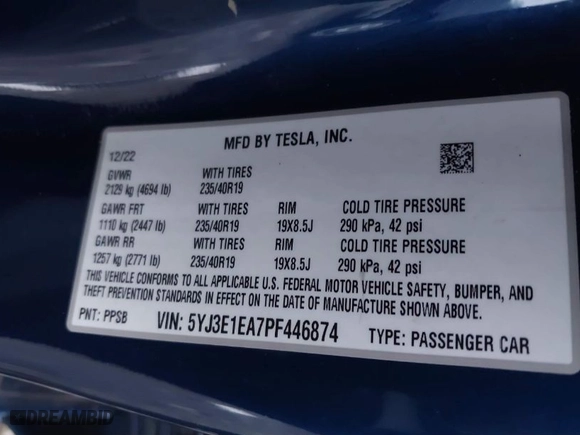 2023 Tesla Model 3 with VIN 5YJ3E1EA7PF446874, listed as a IAAI auction lot 41133303 with 47,748 mi miles. Bid and sale history available at carsss.com. Image 9.
