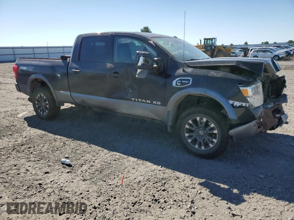 2017 Nissan Titan Pro-4X z VIN 1N6BA1F42HN530830, wystawiony jako Copart lot #63860384 z przebiegiem 317 812 mil mil oraz Szkoda całkowita • Salvage title. Historia ofert i sprzedaży dostępna na DreamBid. Obrazek 4.