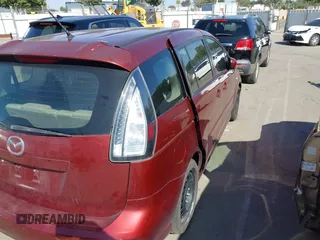 2008 Mazda 5 Grand Touring z VIN JM1CR29L680316865, wystawiony jako IAAI lot #42368393 z przebiegiem 158 732 mil mil oraz . Historia ofert i sprzedaży dostępna na DreamBid. Obrazek 16.