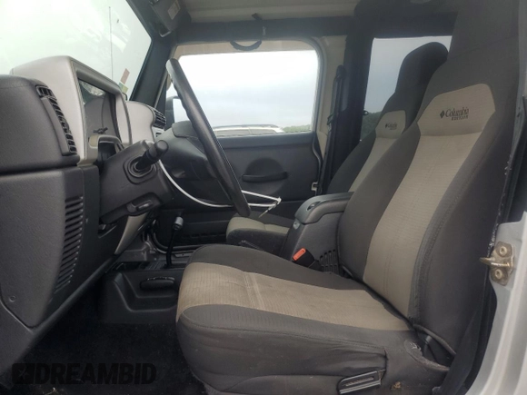 2004 Jeep Wrangler X with VIN 1J4FA39S74P724420, listed as a Copart auction lot 71839944 with 135,742 mi miles and Clean Title. Bid and sale history available at carsss.com. Image 7.