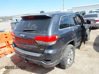 2015 Jeep Grand Cherokee Overland with VIN 1C4RJFCG6FC831641, listed as a IAAI auction lot 41877680 with 143,568 mi miles. Bid and sale history available at carsss.com. Image 4.