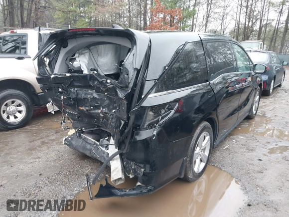 2019 Honda Odyssey EX-L with VIN 5FNRL6H75KB087076, listed as a IAAI auction lot 41542194 with 136,491 mi miles. Bid and sale history available at carsss.com. Image 4.