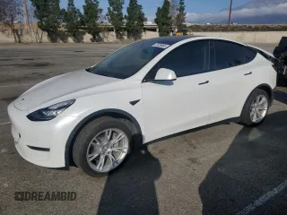 2021 Tesla Model Y Long Range with VIN 5YJYGDEE4MF204219, listed as a Copart auction lot 47429865 with 92,821 mi miles and Salvage Title. Bid and sale history available at DreamBid. Image 1.