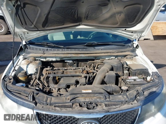 2010 Kia Forte EX with VIN KNAFU4A27A5310573, listed as a IAAI auction lot 41398134 with 167,264 mi miles. Bid and sale history available at carsss.com. Image 10.