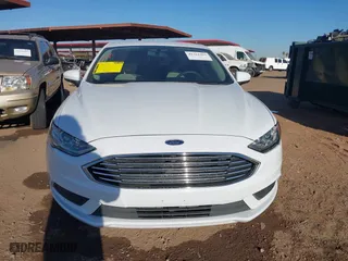 2018 Ford Fusion Hybrid S with VIN 3FA6P0UU0JR204324, listed as a IAAI auction lot 41312303 with 100,527 mi miles. Bid and sale history available at carsss.com. Image 12.