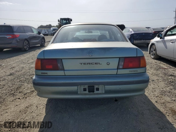 1994 Toyota Tercel DX z VIN JT2EL43T6R0457122, wystawiony jako Copart lot #54426595 z przebiegiem 201 177 mil mil oraz Czysty tytuł • Clean title. Historia ofert i sprzedaży dostępna na DreamBid. Obrazek 6.