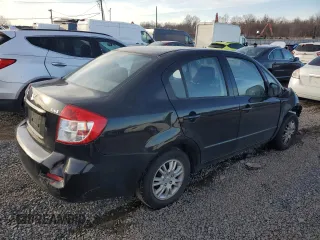 2012 Suzuki SX4 LE with VIN JS2YC5A32C6302316, listed as a Copart auction lot 81703544 with 87,411 mi miles and Salvage Title. Bid and sale history available at carsss.com. Image 3.