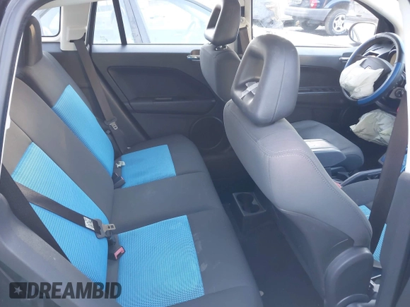 2009 Dodge Caliber SXT with VIN 1B3HB48A89D118869, listed as a IAAI auction lot 41315552 with 198,986 mi miles and . Bid and sale history available at DreamBid. Image 8.