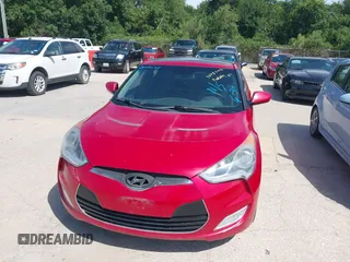 2013 Hyundai Veloster w/Black Int with VIN KMHTC6AD9DU135318, listed as a IAAI auction lot 42632212 with 97,485 mi miles and . Bid and sale history available at DreamBid. Image 6.