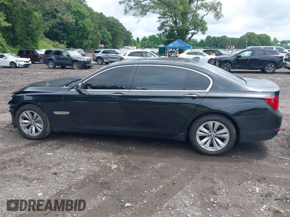 2015 BMW 7 Series 740Li xDrive with VIN WBAYF4C55FG291723, listed as a IAAI auction lot 42694382 with 101,140 mi miles and . Bid and sale history available at DreamBid. Image 14.