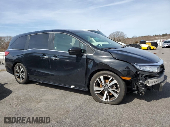 2021 Honda Odyssey Touring with VIN 5FNRL6H89MB008147, listed as a Copart auction lot 49830205 with 58,632 mi miles and Clean Title. Bid and sale history available at carsss.com. Image 4.