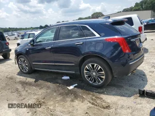 2017 Cadillac XT5 Premium Luxury AWD with VIN 1GYKNERS0HZ239805, listed as a Copart auction lot 61257435 with 104,448 mi miles and Salvage title. Bid and sale history available at DreamBid. Image 2.
