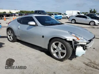 2010 Nissan 370Z Touring with VIN JN1AZ4EH2AM506507, listed as a Copart auction lot 70469504 with 115,594 mi miles and Salvage Title. Bid and sale history available at carsss.com. Image 4.