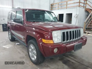 2010 Jeep Commander Sport z VIN 1J4RG4GK6AC140856, wystawiony jako IAAI lot #42285802 z przebiegiem 247 830 mil mil oraz . Historia ofert i sprzedaży dostępna na DreamBid. Obrazek 1.