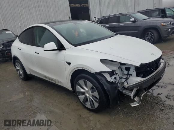2023 Tesla Model Y Long Range z VIN 7SAYGDEE1PA114563, wystawiony jako Copart lot #44423505 z przebiegiem Nie podano mil oraz Szkody całkowita. Historia ofert i sprzedaży dostępna na DreamBid. Obrazek 4.