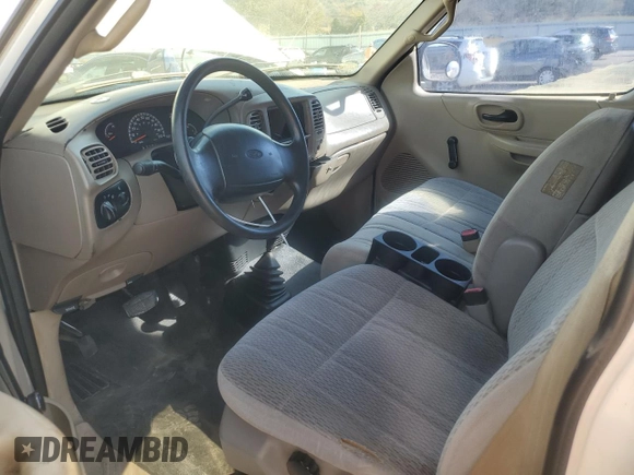 2000 Ford F-150 XL with VIN 1FTRX18W2YNC34320, listed as a Copart auction lot 77832404 with 217,448 mi miles and Clean Title. Bid and sale history available at carsss.com. Image 8.