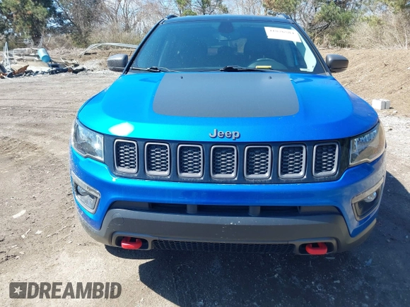 2019 Jeep Compass Trailhawk with VIN 3C4NJDDB5KT683907, listed as a IAAI auction lot 41876584 with 54,685 mi miles and . Bid and sale history available at DreamBid. Image 6.