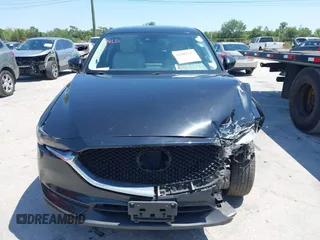 2017 Mazda CX-5 Grand Touring with VIN JM3KFBDL6H0200830, listed as a IAAI auction lot 42005145 with 90,510 mi miles. Bid and sale history available at carsss.com. Image 12.