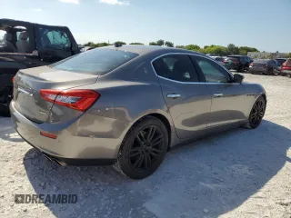 2014 Maserati Ghibli S Q4 z VIN ZAM57RTA6E1090293, wystawiony jako Copart lot #57298875 z przebiegiem 113 805 mil mil oraz Tytuł czysty. Historia ofert i sprzedaży dostępna na DreamBid. Obrazek 3.