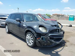 2017 MINI Clubman Cooper S z VIN WMWLN9C36H2E49577, wystawiony jako IAAI lot #42413815 z przebiegiem 64 968 mil mil oraz . Historia ofert i sprzedaży dostępna na DreamBid. Obrazek 1.
