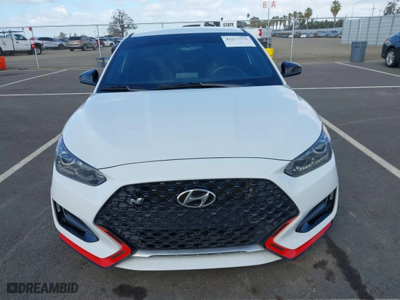 2019 Hyundai Veloster N with VIN KMHT36AH6KU001916, listed as a IAAI auction lot 41577775 with 77,471 mi miles. Bid and sale history available at carsss.com. Image 12.