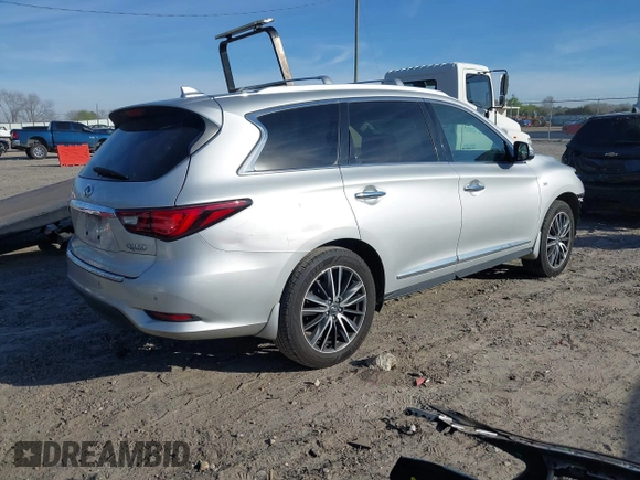 2019 Infiniti QX60 Luxe with VIN 5N1DL0MN8KC555323, listed as a IAAI auction lot 41824366 with 83,596 mi miles and . Bid and sale history available at DreamBid. Image 4.