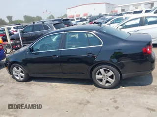 2009 Volkswagen Jetta SE with VIN 3VWRM71K59M137348, listed as a IAAI auction lot 42285086 with 120,645 mi miles and . Bid and sale history available at DreamBid. Image 14.
