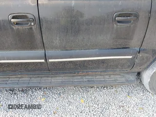 2003 Chevrolet Suburban LT z VIN 1GNEC16Z13J216552, wystawiony jako IAAI lot #40193670 z przebiegiem 235 840 mil mil oraz . Historia ofert i sprzedaży dostępna na DreamBid. Obrazek 12.
