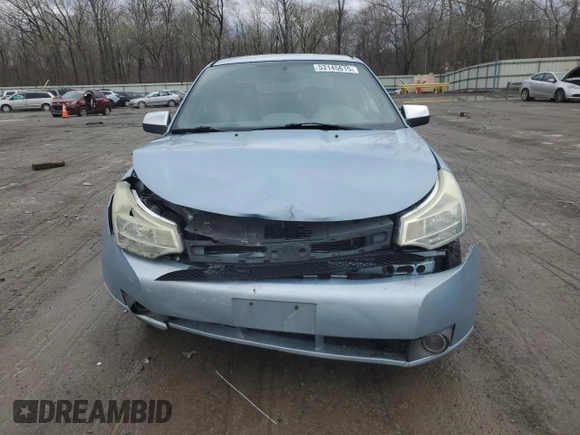 2008 Ford Focus SE z VIN 1FAHP33N48W204502, wystawiony jako Copart lot #53145615 z przebiegiem Nie podano mil oraz Szkoda całkowita • Salvage title. Historia ofert i sprzedaży dostępna na DreamBid. Obrazek 5.