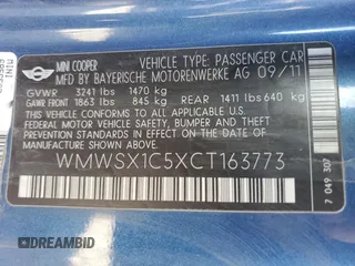 2012 MINI Cooper Coupe with VIN WMWSX1C5XCT163773, listed as a Copart auction lot 85792764 with 70,411 mi miles and Salvage Title. Bid and sale history available at carsss.com. Image 13.