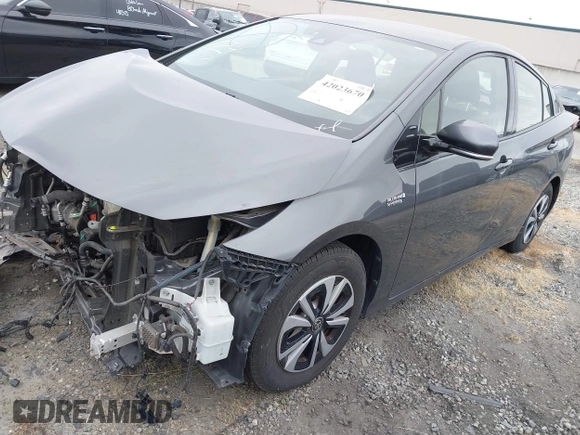2017 Toyota Prius Plus with VIN JTDKARFP7H3054775, listed as a IAAI auction lot 42023670 with 80,759 mi miles and . Bid and sale history available at DreamBid. Image 2.